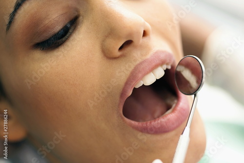 Foto: Closeup of patient's face at dentist Closeup of patient's face at dentist