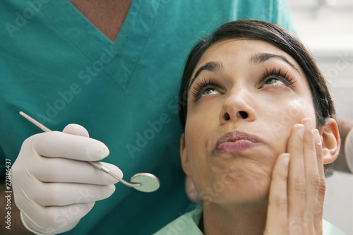 Photo: Patient with toothache at dentist Patient with toothache at dentist