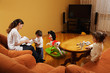 Mother with daughters at home
