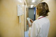 Doctor making telephone call in medical center