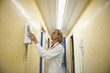 Doctor making telephone call in medical center