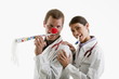 Male and female doctors with party toys