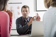 Doctor holding bottle of pills for patients