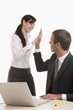 Man and woman doing high five