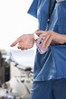 Photo: Nurse applying hand sanitizer in hospital Nurse applying hand sanitizer in hospital
