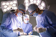 Concentrating surgeons performing operation in operating room