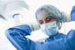 Surgeon wearing surgical mask in operating room