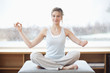 Young woman with amputee arm in yoga pose