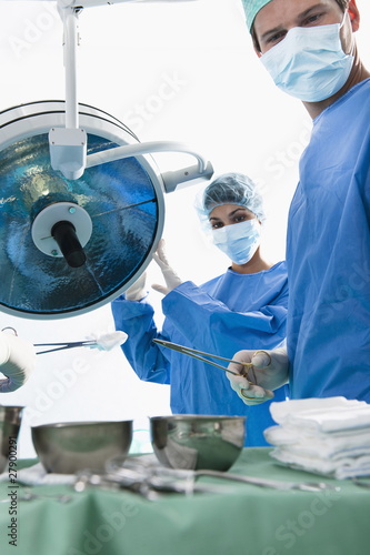 Photo: Medical personnel in operating room Medical personnel in operating room
