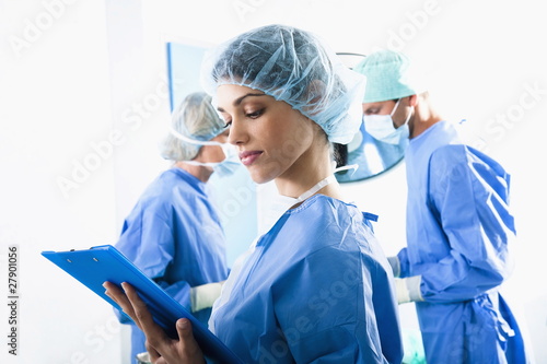 Photo: Medical personnel in operating room Medical personnel in operating room