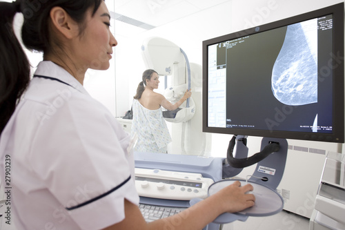Photo: Radiologist reviewing results of patients mammogram Radiologist reviewing results of patients mammogram