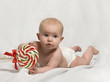 Baby on Tummy with Candy Cane Lollipop