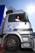 Truck driver driving semi-truck