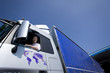 Truck driver driving semi-truck