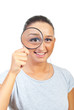 Woman magnifying eye