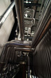 Equipment, cables and piping as found inside of a modern industr