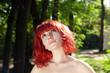 Pretty woman posing in forest