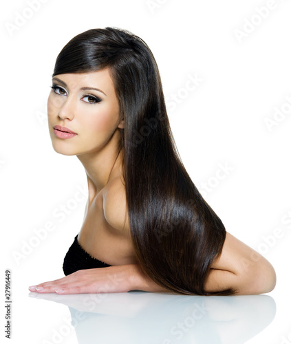 Photo: Beautiful young woman with long straight brown hair Beautiful young woman with long straight brown hair