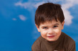 Smiling three year old boy