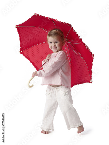 Photo: Little girl holding an umbrella Little girl holding an umbrella