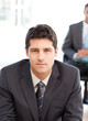 Serious businessman during an interview with a co-worker
