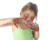Foto: Girl with paint on face and hands Girl with paint on face and hands