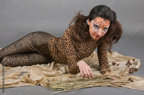 Photo: Portrait of girl with leopard's face-art Portrait of girl with leopard's face-art