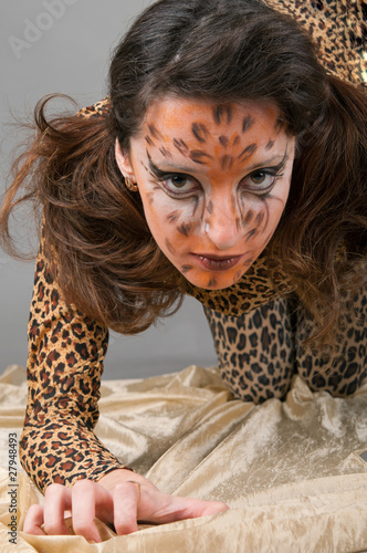 Photo: Portrait of girl with leopard's face-art Portrait of girl with leopard's face-art