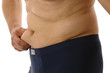 Foto: Mann mit Bauch kneift sich in die Speckrolle Mann mit Bauch kneift sich in die Speckrolle