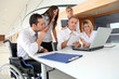 Foto: Group of office workers in a business meeting Group of office workers in a business meeting