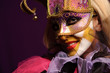 sexy woman in violet party mask