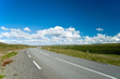 Empty road with a beautiful blue sky in horizon