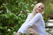 Photo: Girl with bird-cherry flowers Girl with bird-cherry flowers