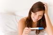 Pregnancy test - happy surprised woman Pregnancy test - happy surprised woman