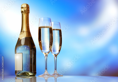 Photo: Champagne glasses on celebration table Champagne glasses on celebration table
