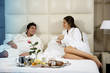 Relaxed Couple in Bed