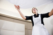 Maid Making Bed