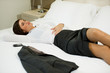 Tired Businesswoman In Hotel Room