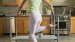 Woman dancing in kitchen