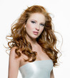 Photo: Beautiful woman with long curly-headed hairs Beautiful woman with long curly-headed hairs