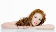 Photo: Beautiful red-haired woman with long wavy hairs Beautiful red-haired woman with long wavy hairs