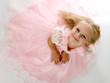 little girl in a pink elegant dress.