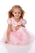 little girl in a pink elegant dress.