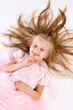 little girl in a pink elegant dress.