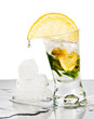 Photo: Ice cubes and glass on a white background Ice cubes and glass on a white background