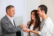 Young couple buying new home Young couple buying new home