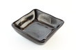 japanese ceramic bowl for  sauce. On white paper.