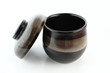 Japanese ceramic cup for tea or soup. On white paper.