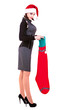 Business woman in black dress and hats of Santa Claus