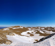 Hills with snow on background clean blue sky Hills with snow on background clean blue sky